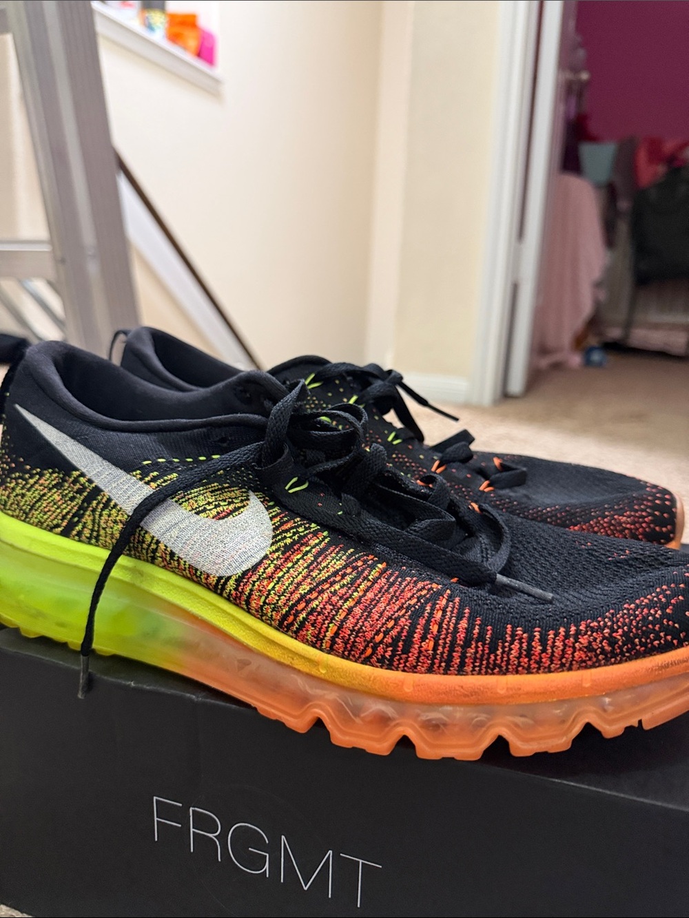 Nike Black Flyknit Sneakers with Neon Yellow & Orange Gradient Sole